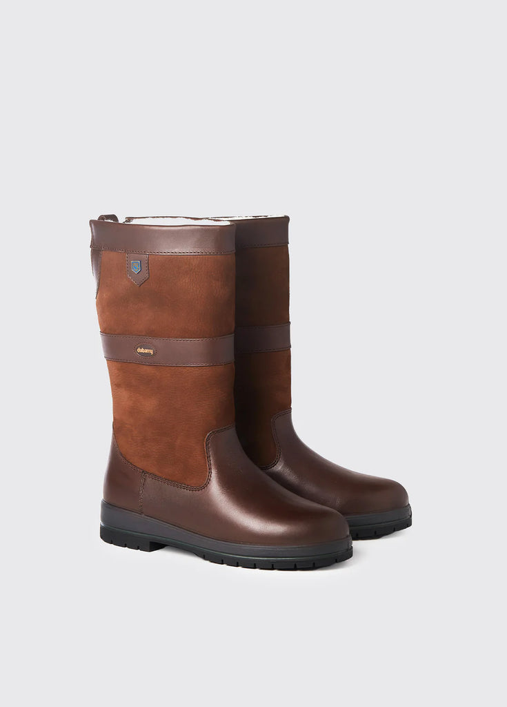 Pair of Donegal Country Boots, fur-lined, waterproof, breathable, and leather in brown, displayed on a grey studio background.